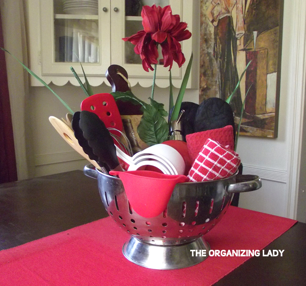 Create a fun kitchen gift basket in a colander. #GiftIdea