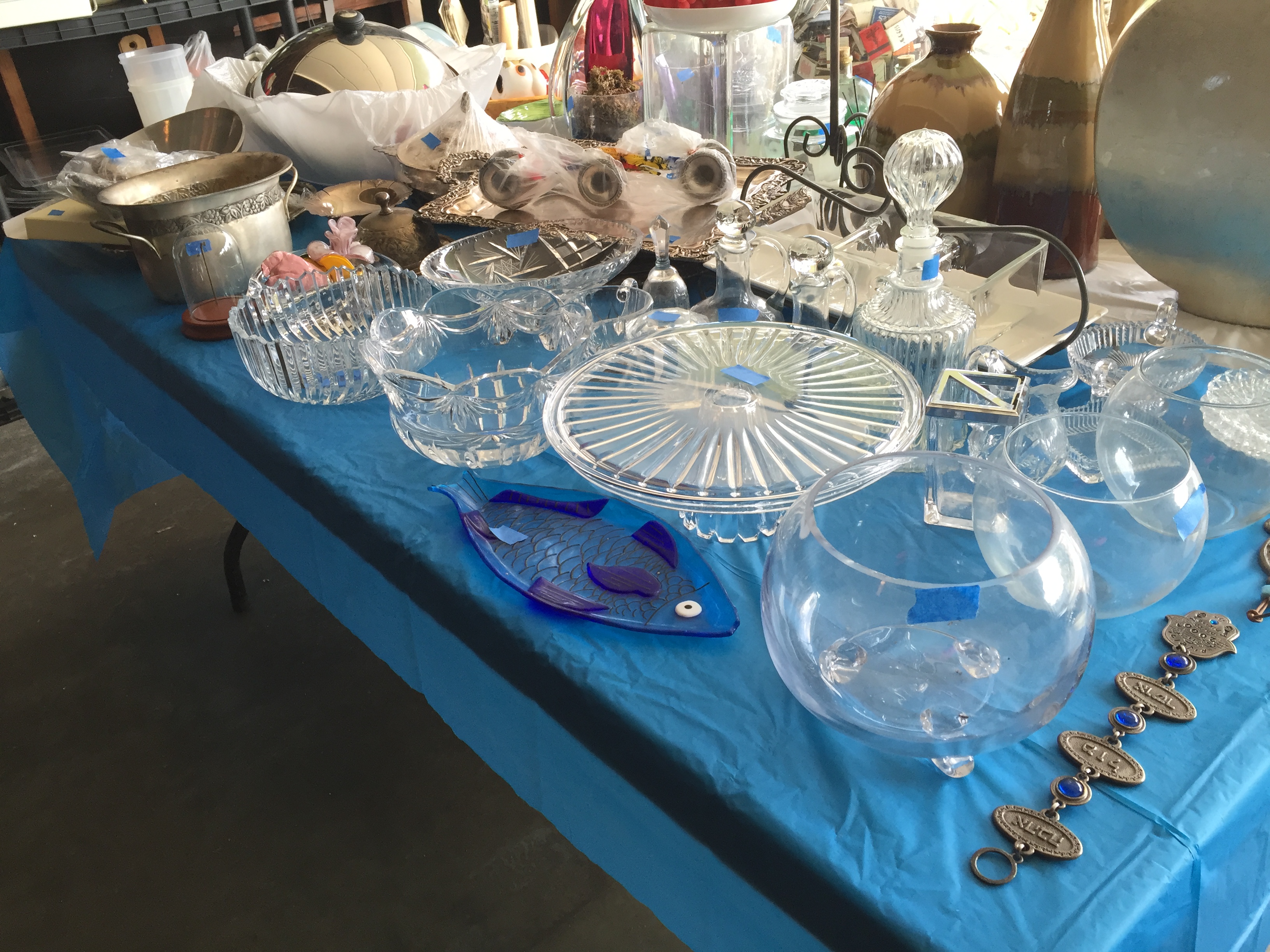 estate sale glassware display table 